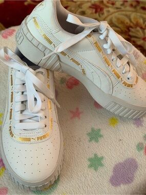 Puma White Leather Sneakers with Gold Accent Trim